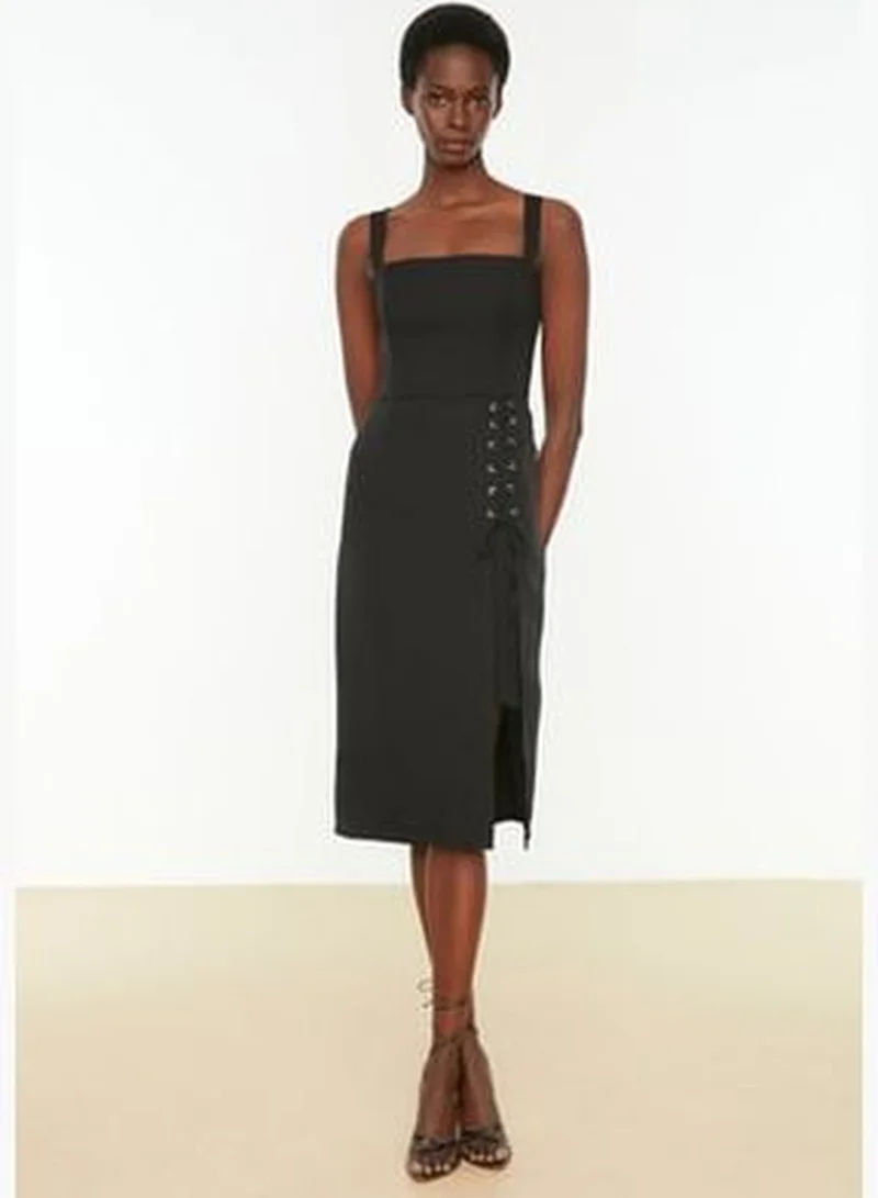 trendyol Knitted Black Midi Dress with Eyelets and a Slit TWOSS19EL0079