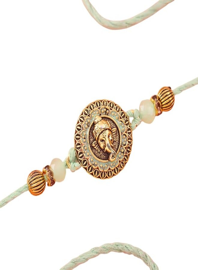 Floweraura Premium Handcrafted Graceful Mint Green Beads Golden Ganesha Rakhi With Roli Packet- Rakhi For Brother, Bhai, Kids, Bhaiya, Cousins & Rakshabandhan Gift (Same Day Delivery) - Image 1