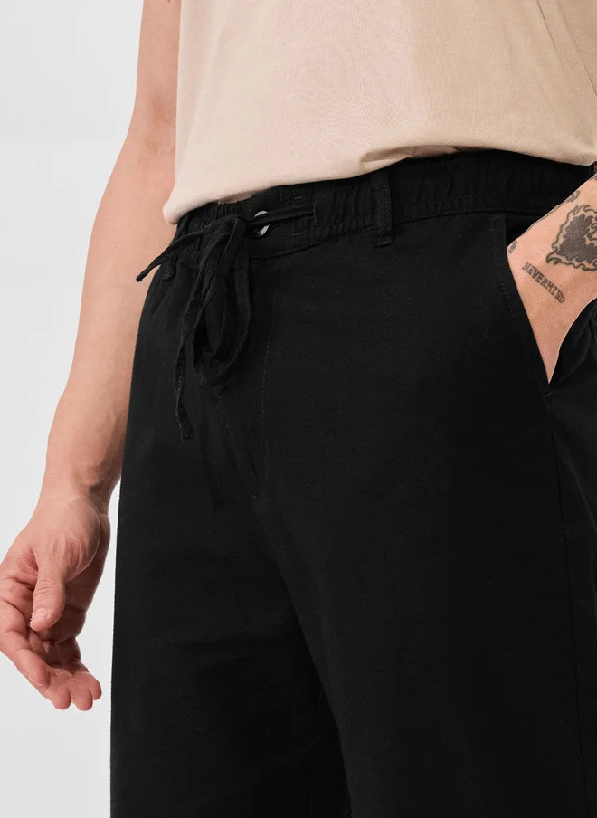 The Souled Store  The Souled Store Men Straight Fit Solid Black Pants  | Best Price UAE