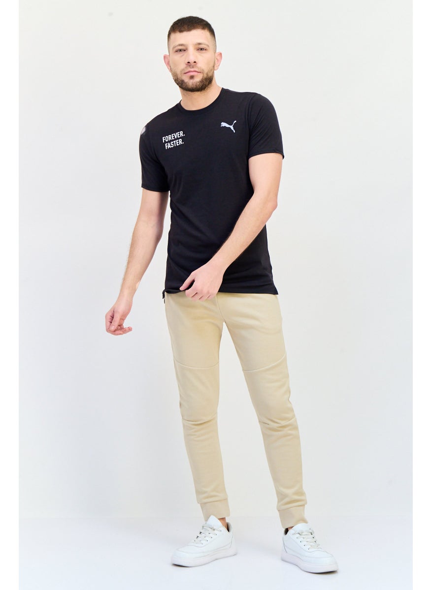 PUMA Men Sportswear Fit Short Sleeve Outdoor T Shirt, Black  - Image 4