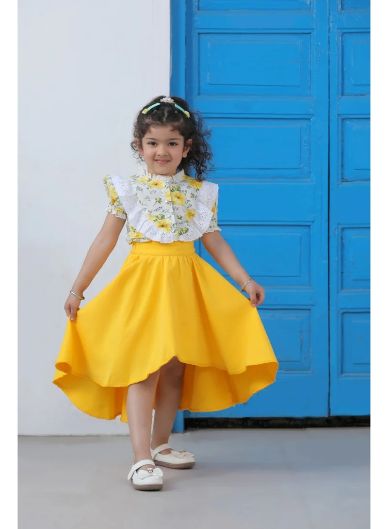 Luxe & Hardy بلوزة بأكمام منفوخة وتنورة واسعة من الأمام ومن الخلف