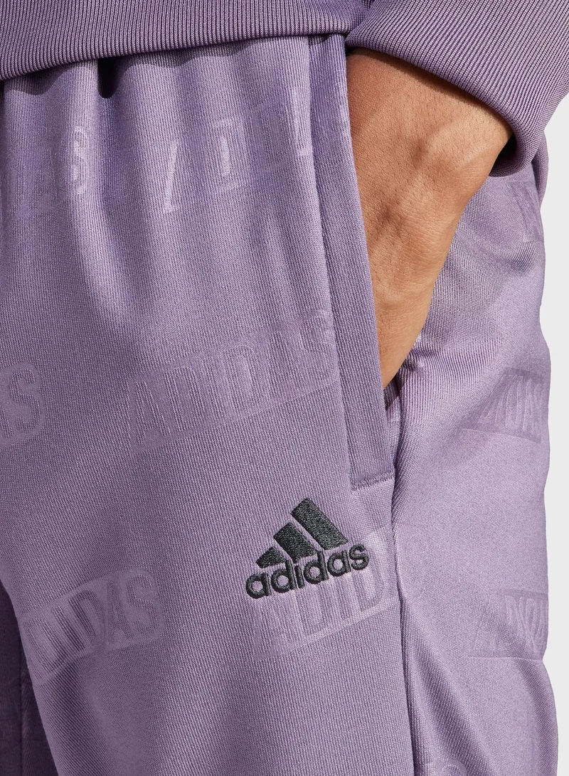 adidas بنطال كيو 4 بشعار كبير