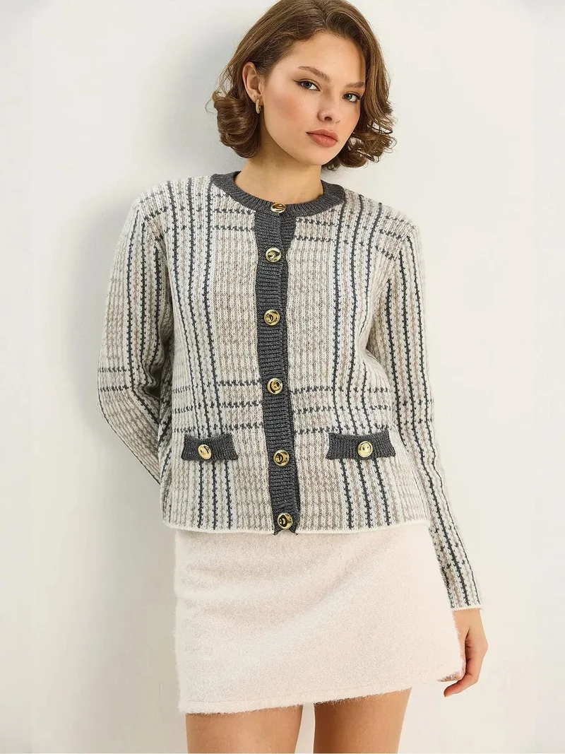 بيانكو لوتشي كارديجان محبوك بأزرار مربعات لوكسي