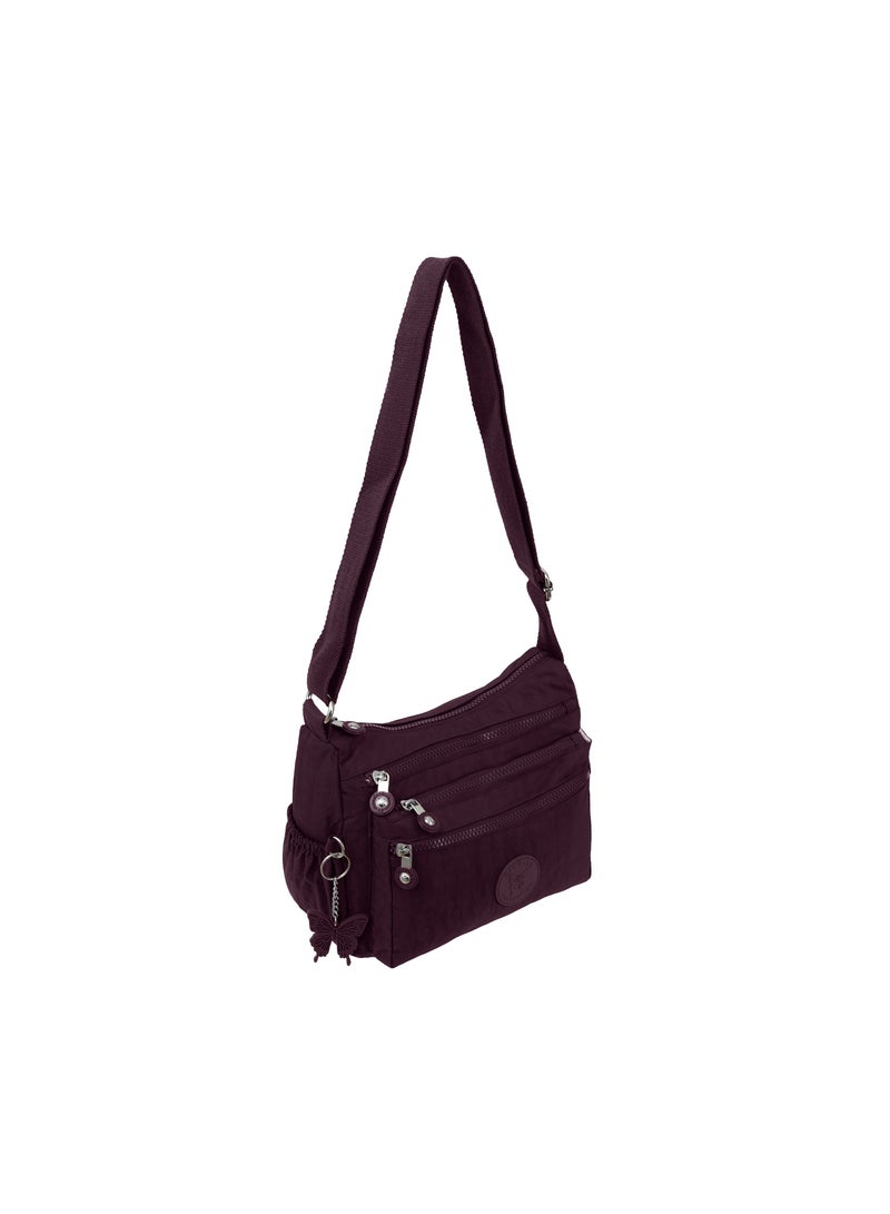 مجموعة كابريس حقيبة كروس بودي متوسطة الحجم للجنسين - نايلون مقاوم للماء، خفيفة الوزن وصغيرة الحجم، لون عنابي - Image 5