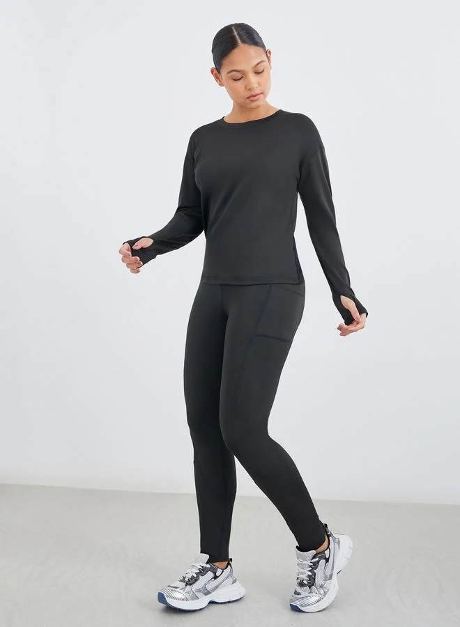 ستايلي Styli Pack of 3 - Double Layer Open Back Top, Cross Back Sports Bra and Leggings