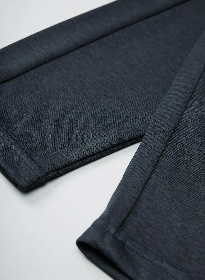 تكنوسبورت بنطلون رياضي بألوان متضاربة وجيوب بسحاب