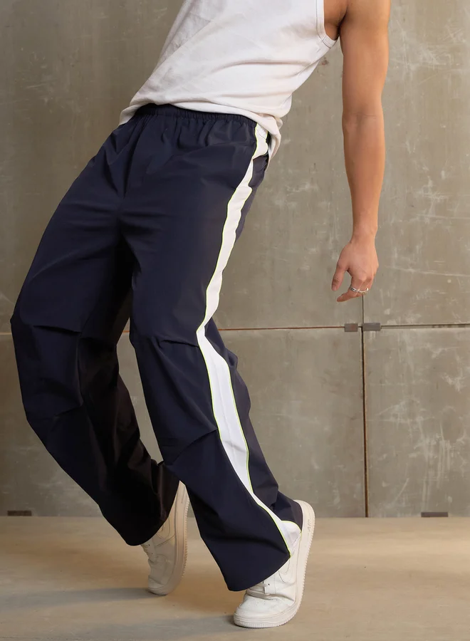 SASSAFRAS Side Panel Baggy Parachute Pants