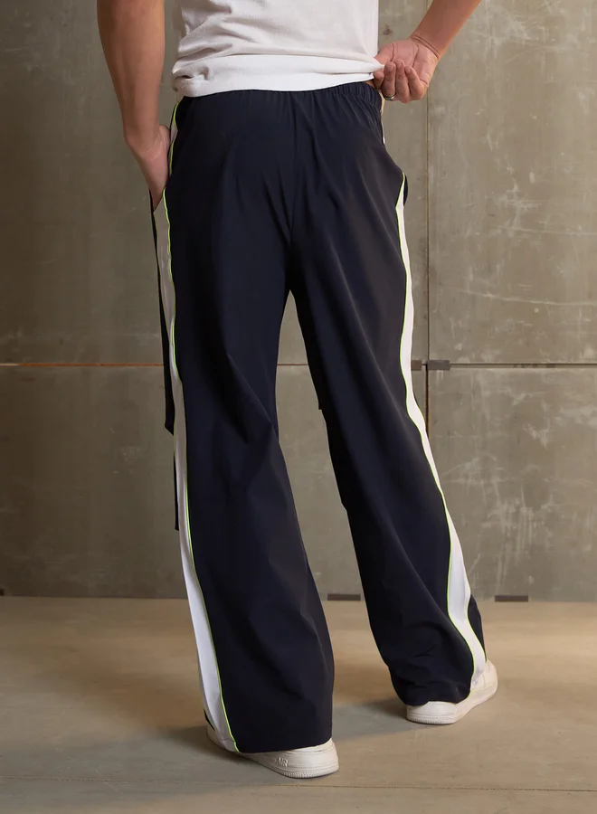 SASSAFRAS Side Panel Baggy Parachute Pants