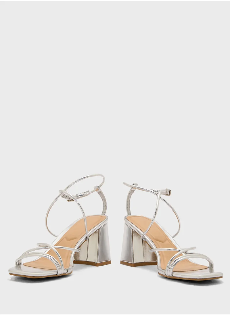 ترافل من نمشي Flaire Block Heel Multi Strap Ankle Strap Block Heel Sandal