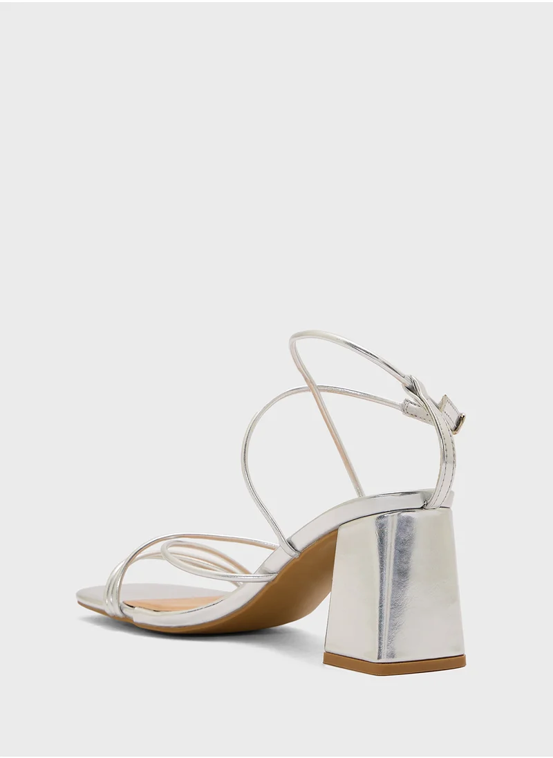 ترافل من نمشي Flaire Block Heel Multi Strap Ankle Strap Block Heel Sandal