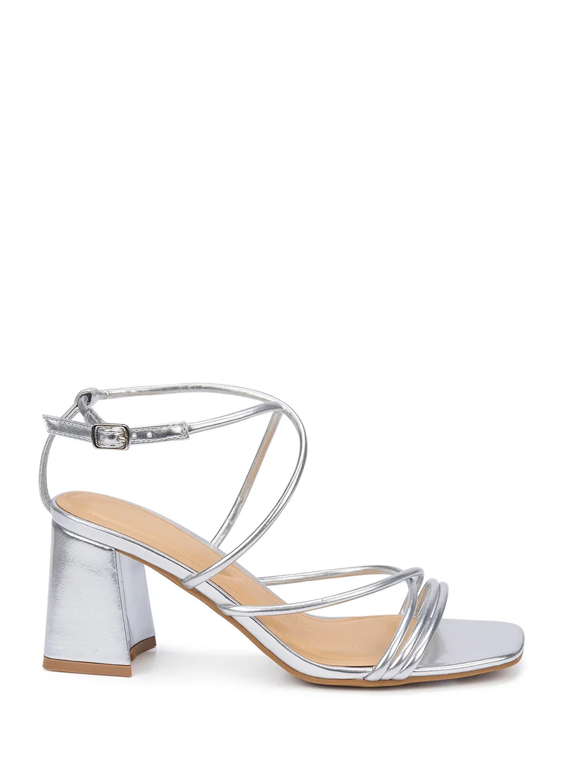 ترافل من نمشي Flaire Block Heel Multi Strap Ankle Strap Block Heel Sandal