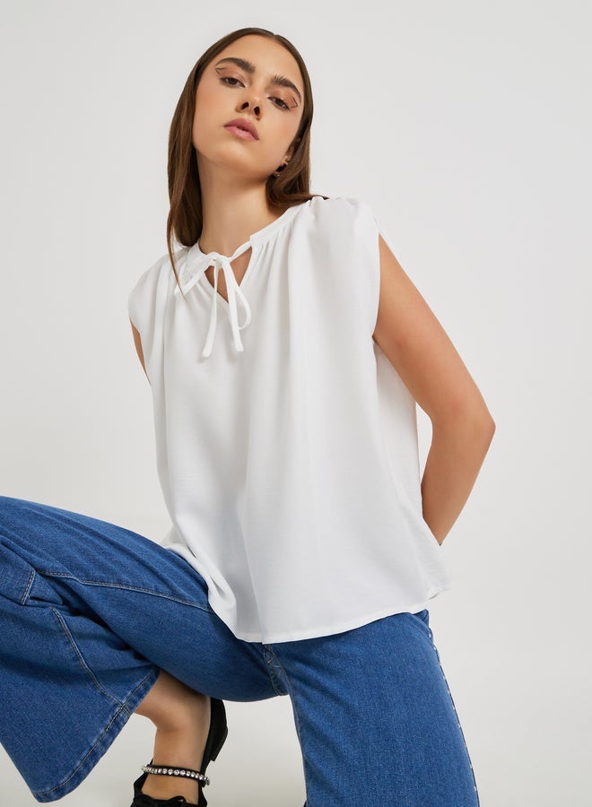 Take Two Solid Sleeveless Tie-Up Neck Blouse - Image 3