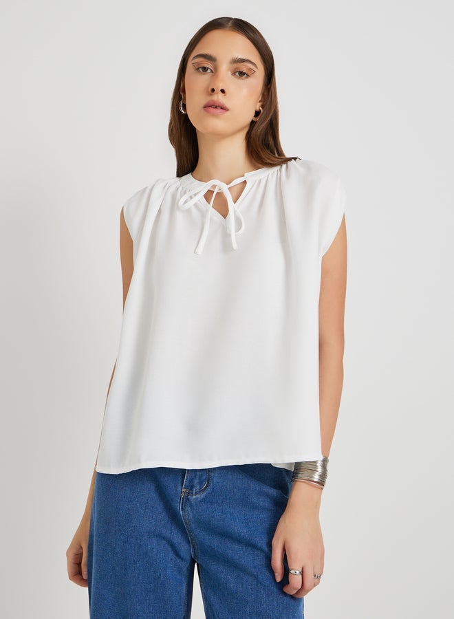 Take Two Solid Sleeveless Tie-Up Neck Blouse - Image 1