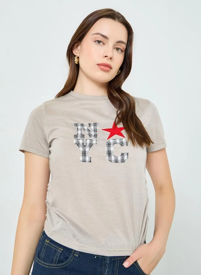 Styli Women Beige Graphic Print Ruched T-Shirt