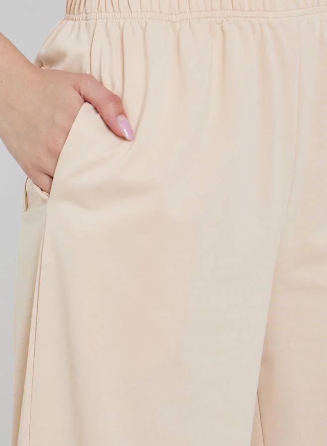 تايك تو بنطال بتفاصيل جيب مُطبع بخصر مطاطي