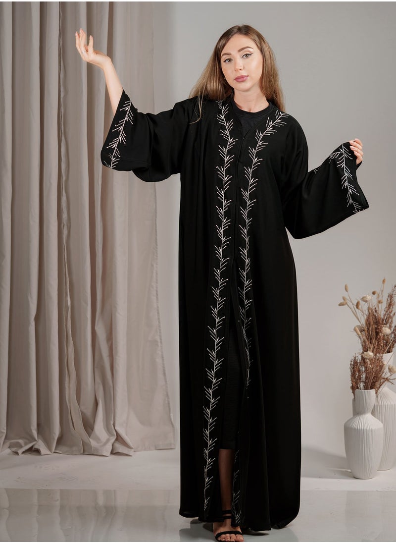 Elegant Black Abaya with Intricate White Embroidery and rhinestones embellishments - pzsku/Z5CFBEC9DDDABED93DE9CZ/45/_/1728650108/44cd40f2-f594-47bc-a838-38e6b8184eab