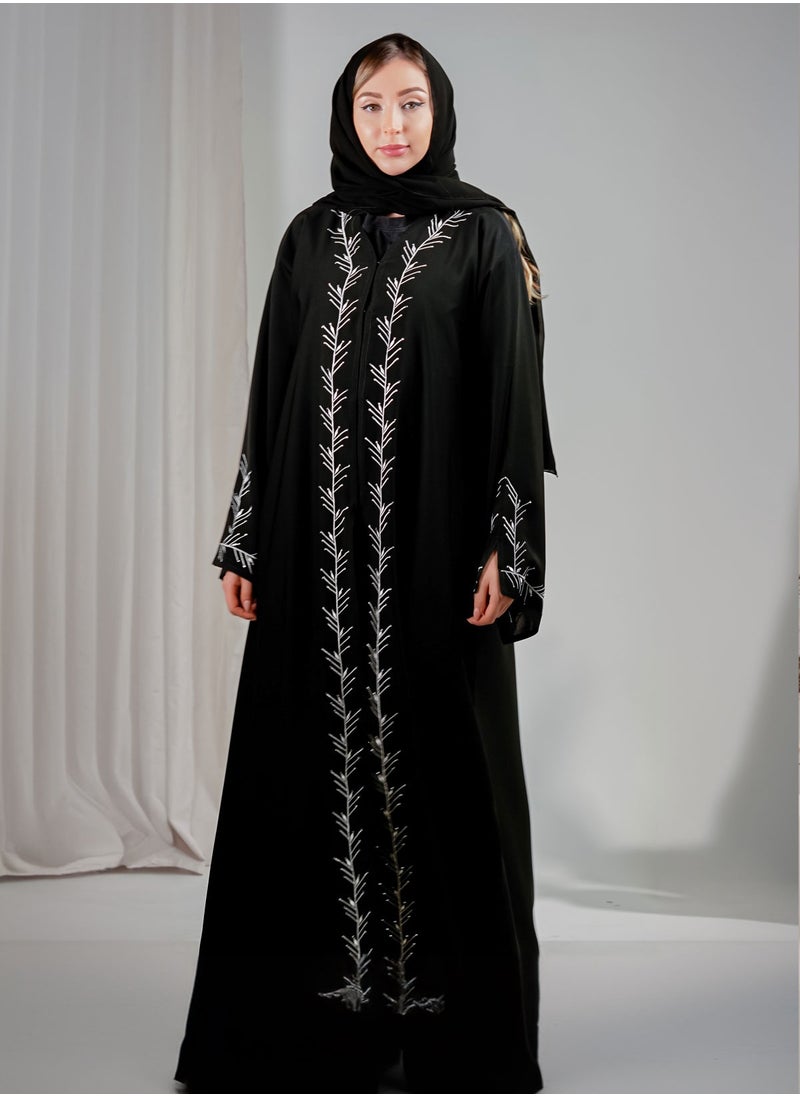 Elegant Black Abaya with Intricate White Embroidery and rhinestones embellishments - pzsku/Z5CFBEC9DDDABED93DE9CZ/45/_/1728650118/32ec67f4-8cc5-43b9-8d93-649f683a582c