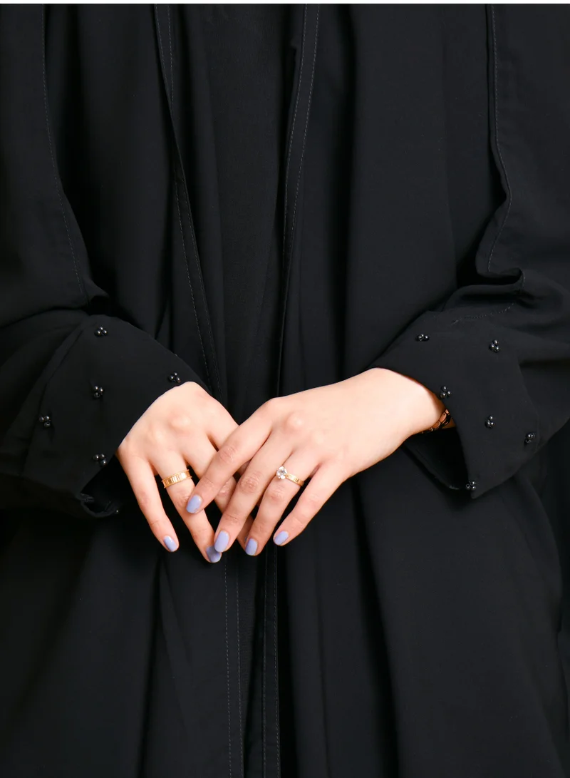 HAWRAA ABAYA Ras wrap abaya with narrow sleeves decorated with black pearls and nice summer fabric
