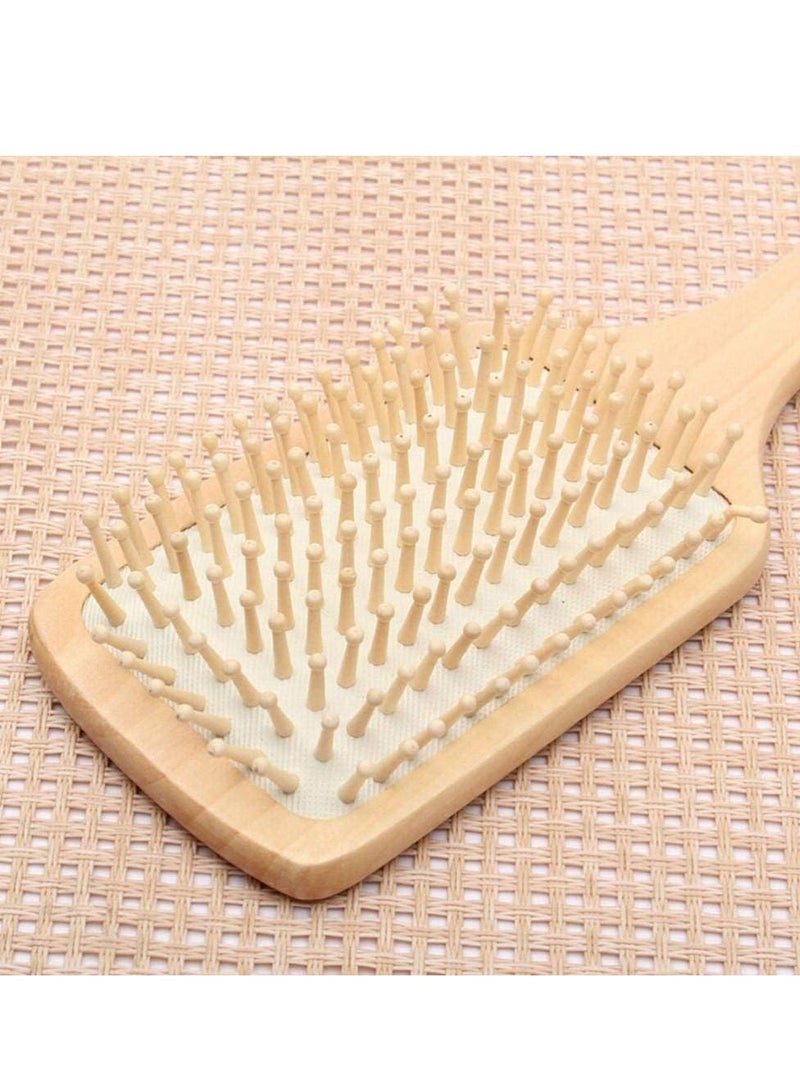 Loquat Anti-static medical hair brush made of wood with unique paddle handle and innovative opening, equipped with keratin bristles that ensure a comfortable massage and improve scalp health. - Image 5