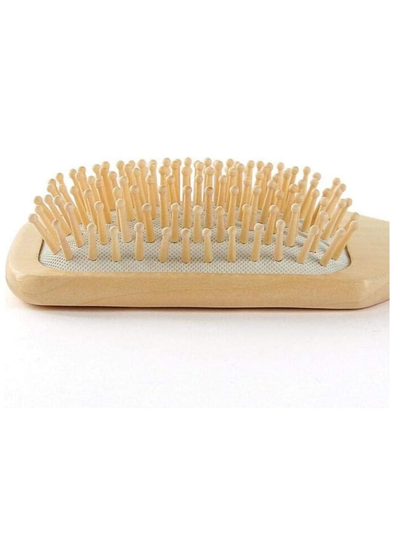 Loquat Anti-static medical hair brush made of wood with unique paddle handle and innovative opening, equipped with keratin bristles that ensure a comfortable massage and improve scalp health. - Image 3