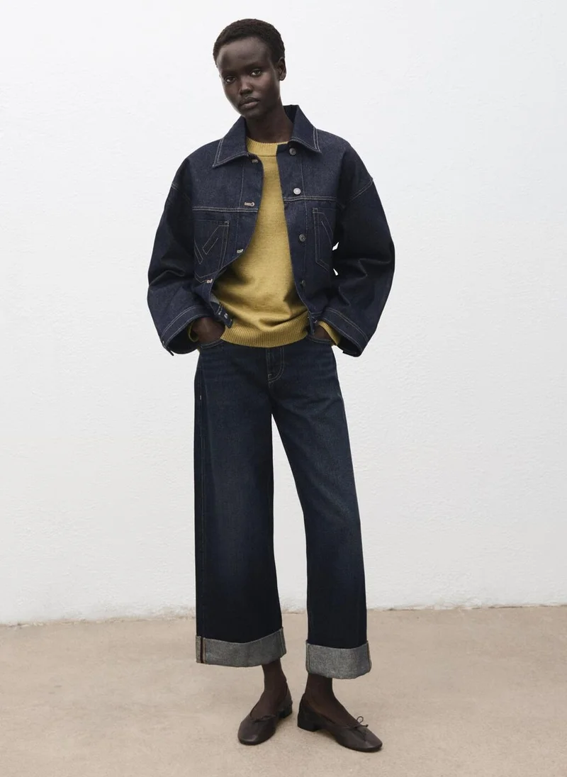 مانجو كنزة فضفاضة بحواف مضلعة