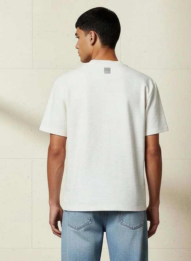 Lee Cooper  Lee Cooper Men Regular Fit Crew Neck Short Sleeves Textured T-shirt for Men | Best Price UAE