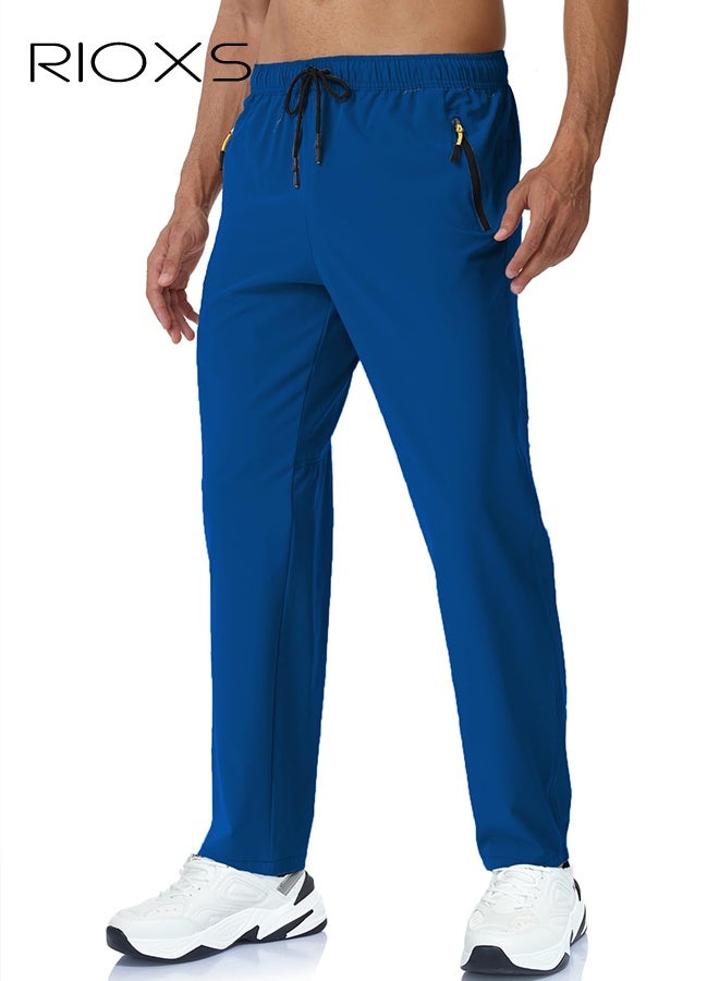 RIOXS ​​Men's Blue Quick-Dry Jogger Pants, Mid-Rise Athletic Trousers with Zipper Pockets and Drawstring Waist, Breathable Running Pants for Gym, Hiking and Outdoor Sports​, Drawstring Waist Joggers, Stretchable Workout Trousers - Image 1