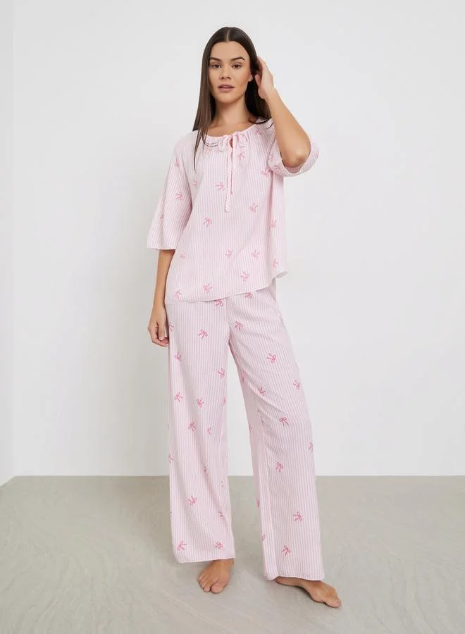Styli All-Over Stripe and Bow Print Tie-Up Neck Top and Pyjama Set