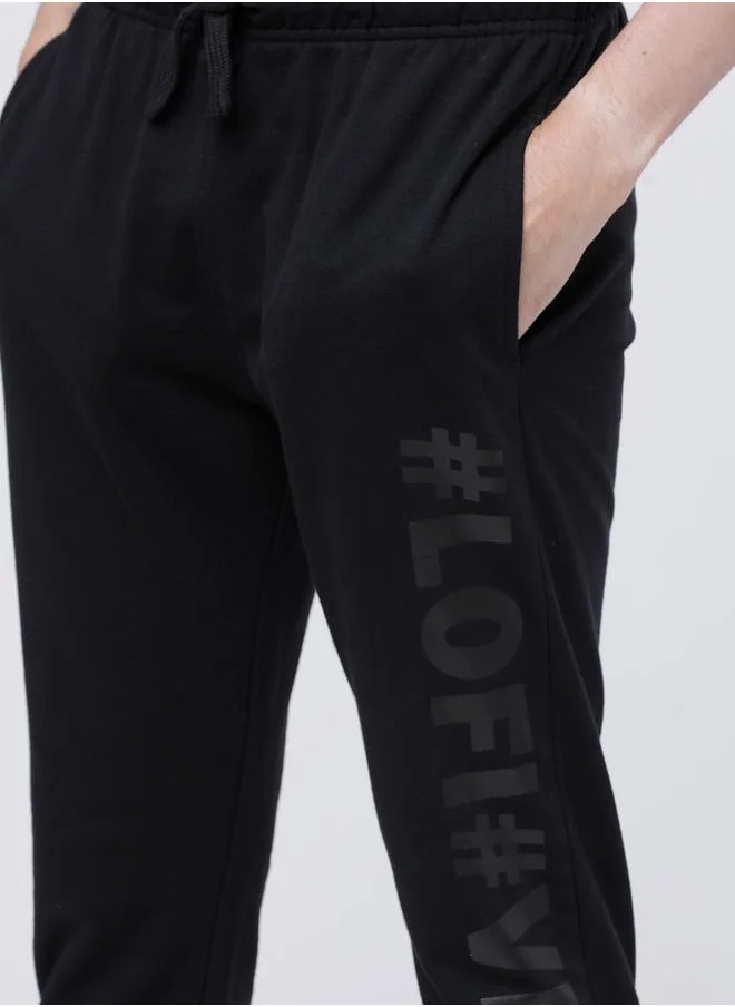 هاي لاندر Slogan Print Slim Fit Track Pants by Styli
