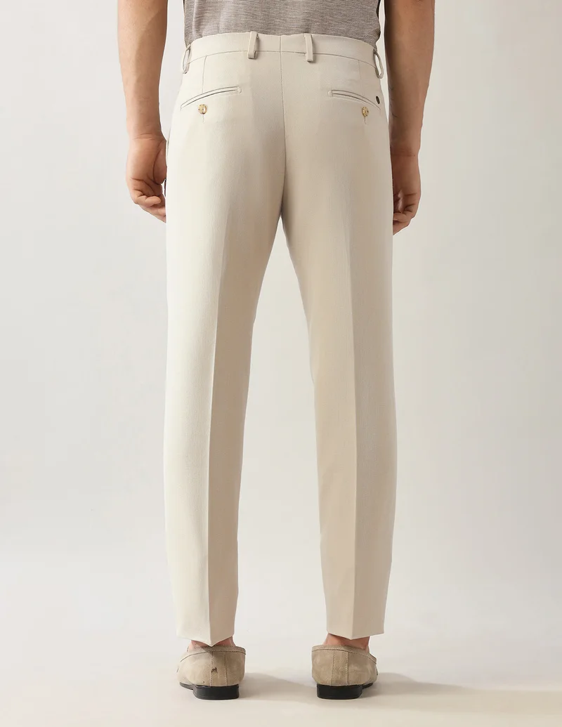 Arrow Beige Textured Autoflex Trousers for Men | Best Price UAE