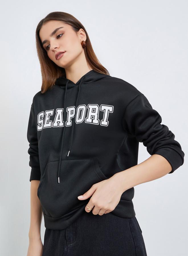 Styli Women Black Graphic Printed Oversize Hoodie - Image 1
