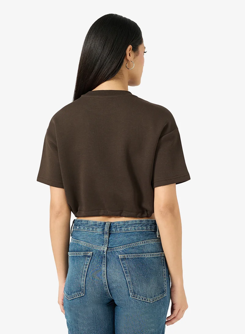 Reebok  Urban Tech Cropped T-Shirt for Women | Best Price UAE