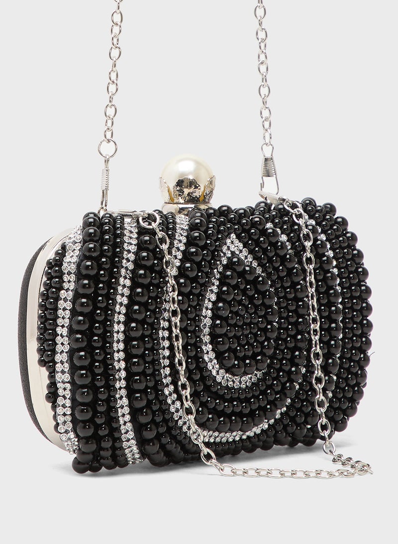 حقيبة يد مرصعة بأحجار الراين أحادية اللون