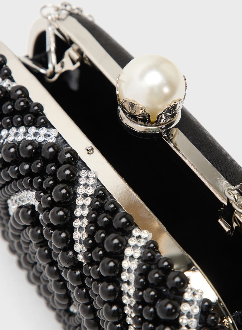 حقيبة يد مرصعة بأحجار الراين أحادية اللون