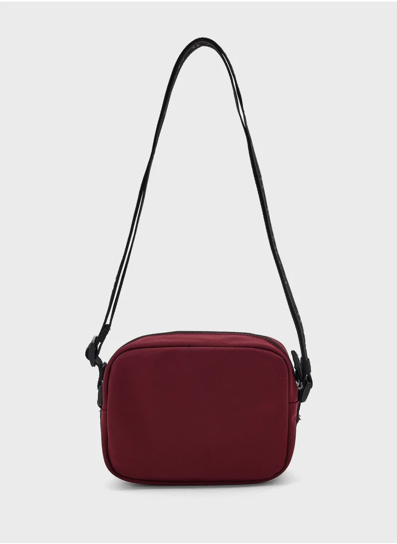 تومي جينز Zip Over Crossbody