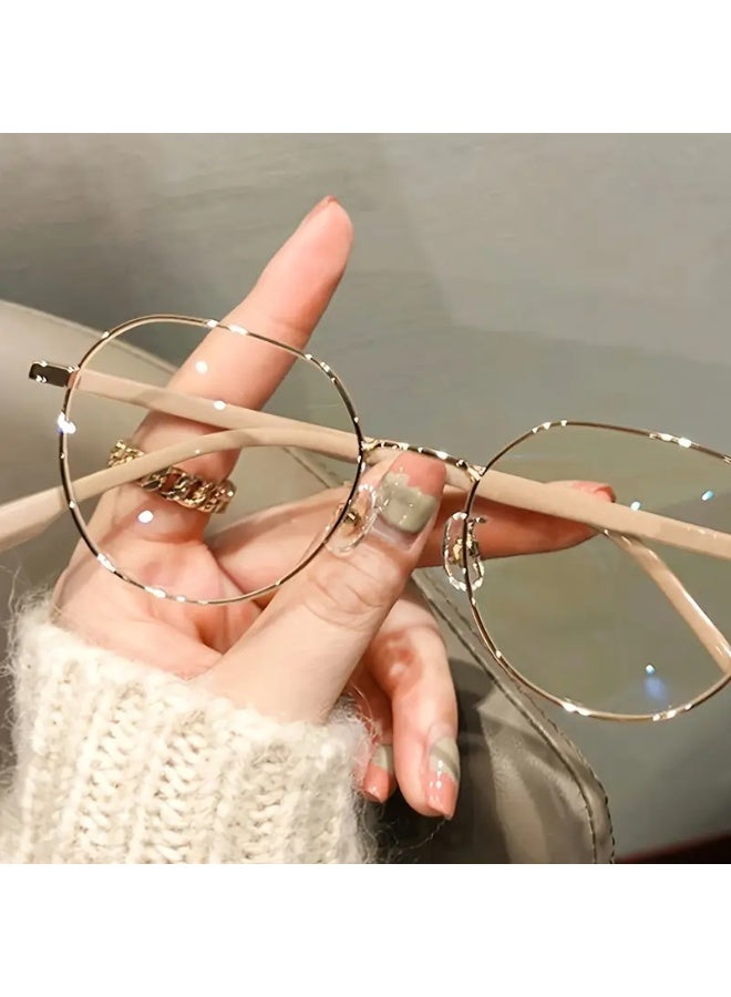 نظارات نسائية مستديرة أنيقة بإطار ذهبي وبيج معدني - Image 1