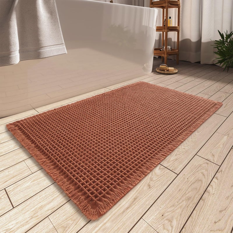 AMOAMI Upgraded Waffle Bath Mat, Super Absorbent Non Slip Bath Mats for Bathroom Floor, Machine Washable Bathroom Rugs with Tassels, Rubber Backed Bathroom Mats, Ultra Soft, 17" x 24", Dirty Orange - Image 1