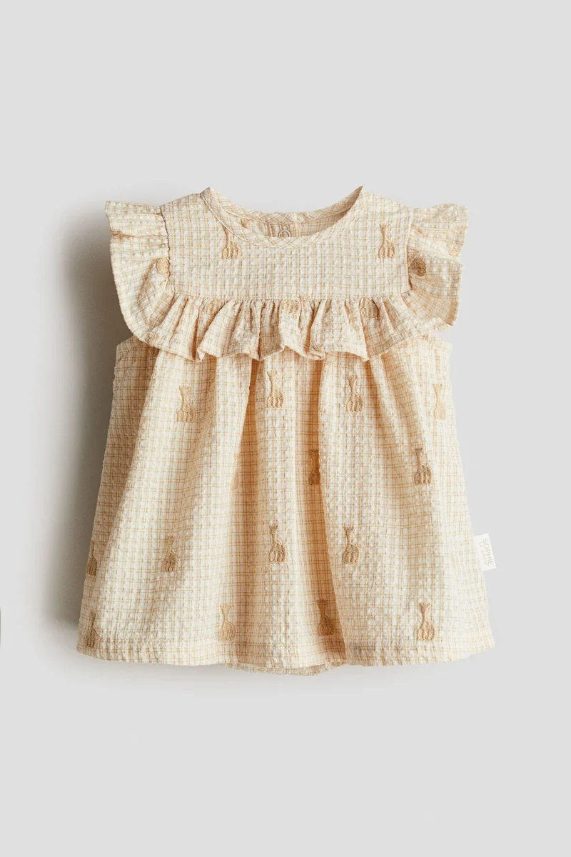 اتش اند ام فستان سيزوكر بتفاصيل مطرزة