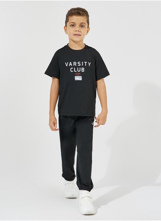 Varsity Print Oversized T-Shirt & Joggers Set - pzsku/Z5D50A0E1A88184274EEEZ/45/_/1724411082/4066a969-addf-4de7-9892-08318806b731