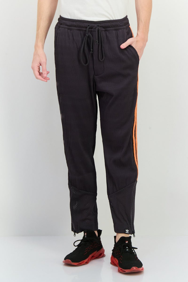 adidas Originals Men Sportswear Fit Outdoor Track Pants, Washed Black  - Image 1