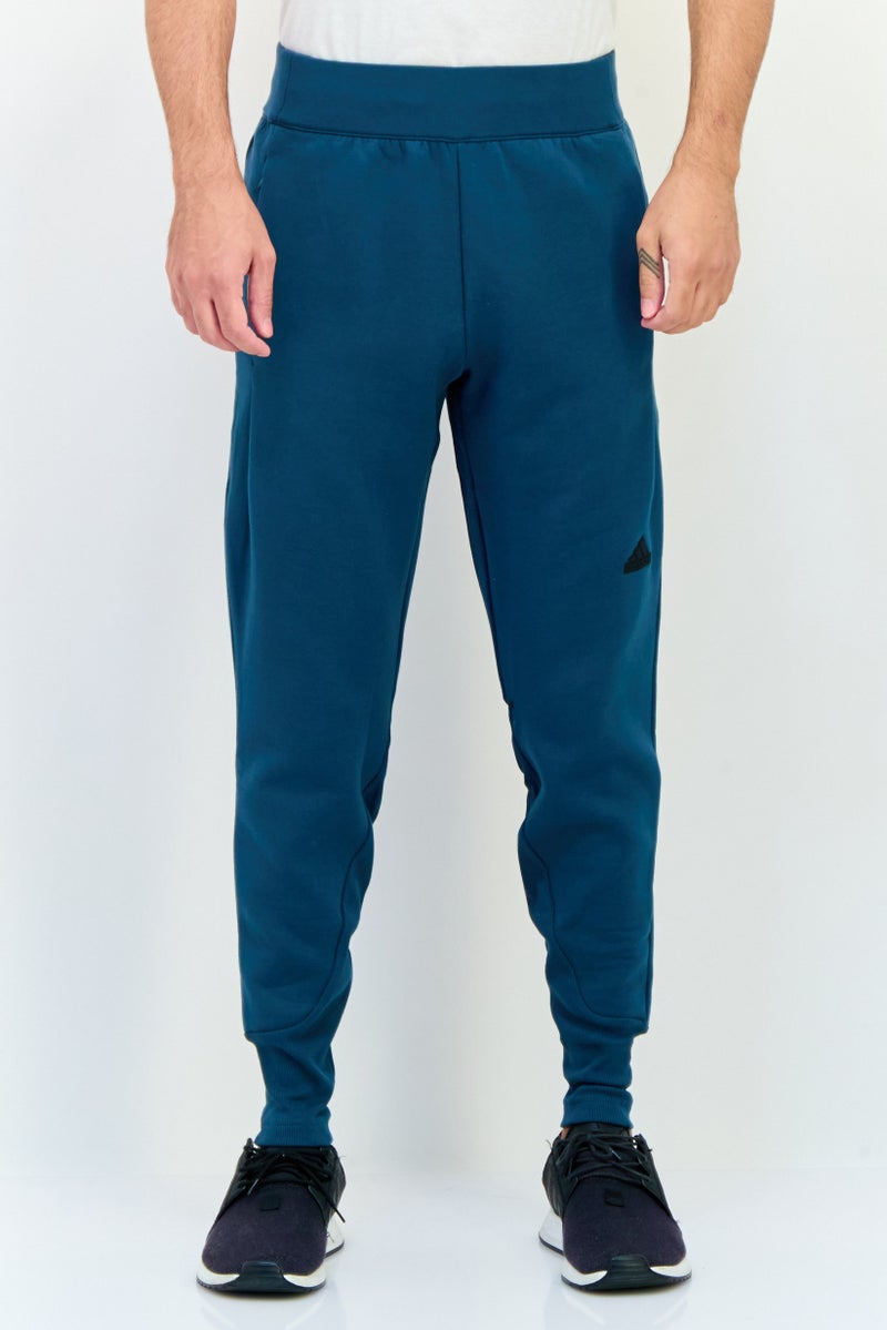 Adidas Men Regular Fit Outdoor Sweatpants, Teal Green  - Image 1