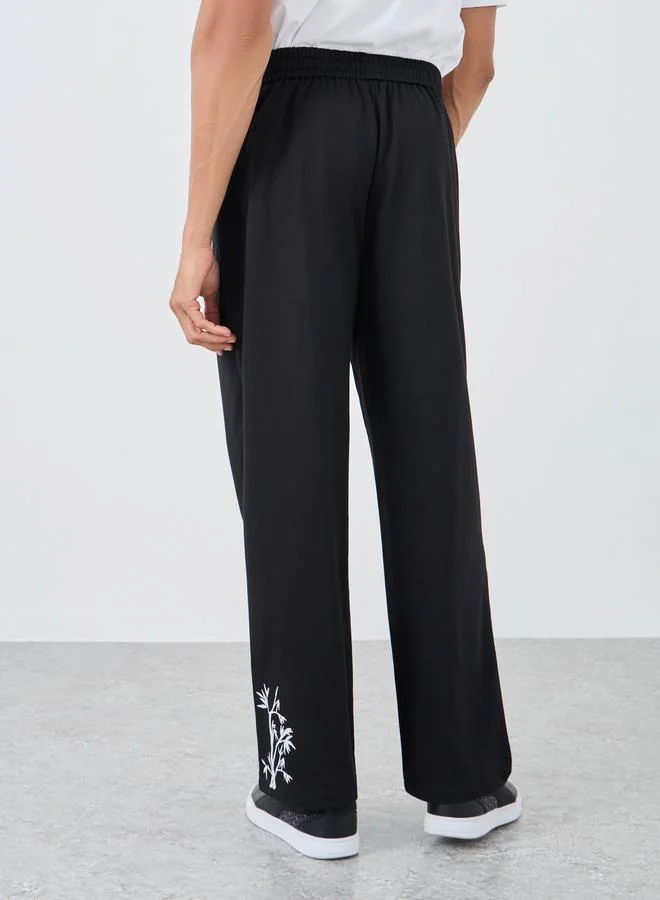 Styli Styli Woven Relaxed Fit Joggers with Graphic Print