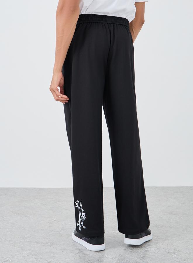 Styli Woven Relaxed Fit Joggers with Graphic Print - Image 4