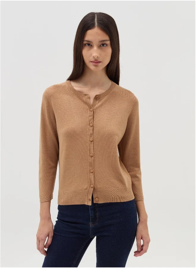 او في اس Cardigan with three-quarter sleeves