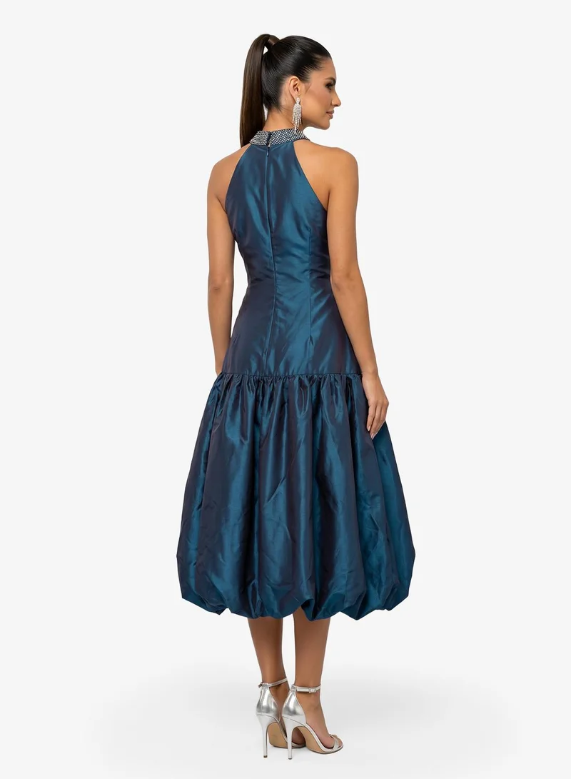 Namshi X Halter Neck Ball Gown With Drop Waist Detail
