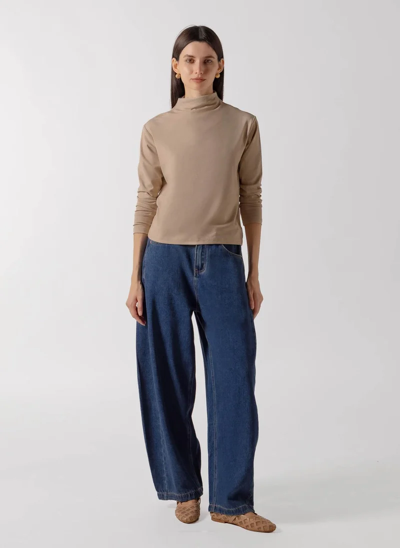 CURVED SEAM BARREL JEANS