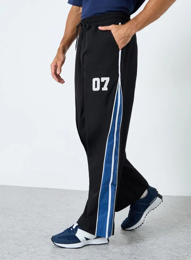 Styli Styli Oversized Fit Cut and Sew Detail Parachute Pant
