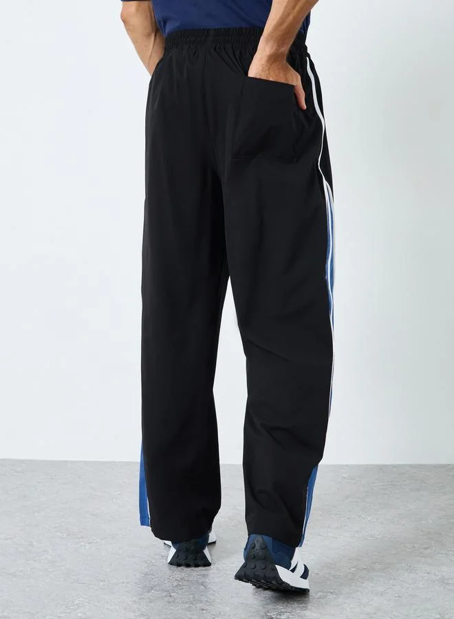 Styli Oversized Fit Cut and Sew Detail Parachute Pant