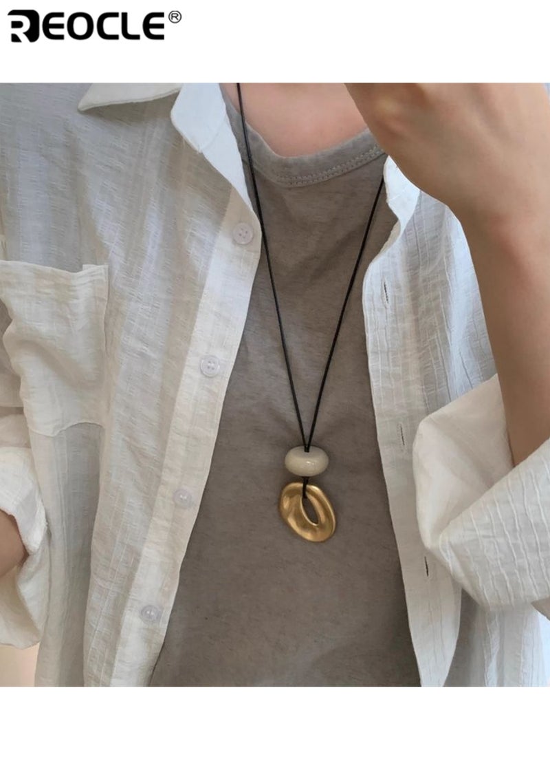 REOCLE Women's Irregular Pendant Necklace Minimalist Artistic Necklace with Adjustable Black Cord Trendy Bohemian Style Necklace with Unique Geometric Design - Image 1