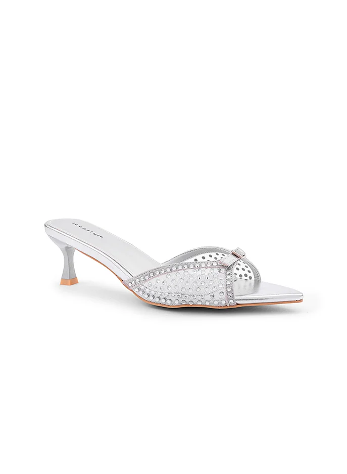 أيقون Heel slipper adorned with sparkling crystal accents.